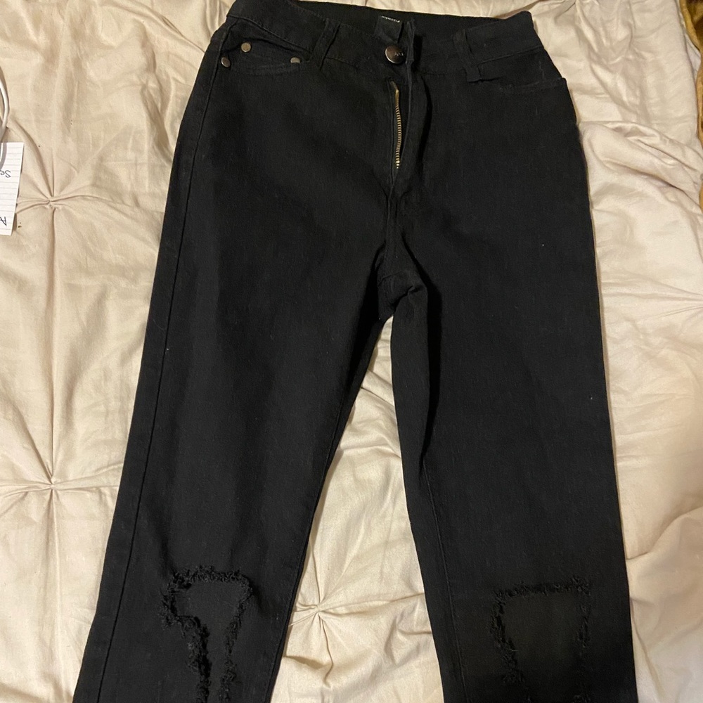 black ripped jeans